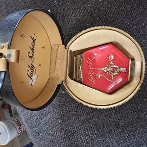 Vintage Lady Schick Red Compact with Gold Accents